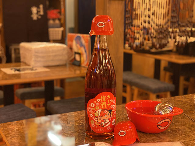 Plum Wine served in a baseball cap shaped cup (Hiroshima Toyo Carp baseball team)