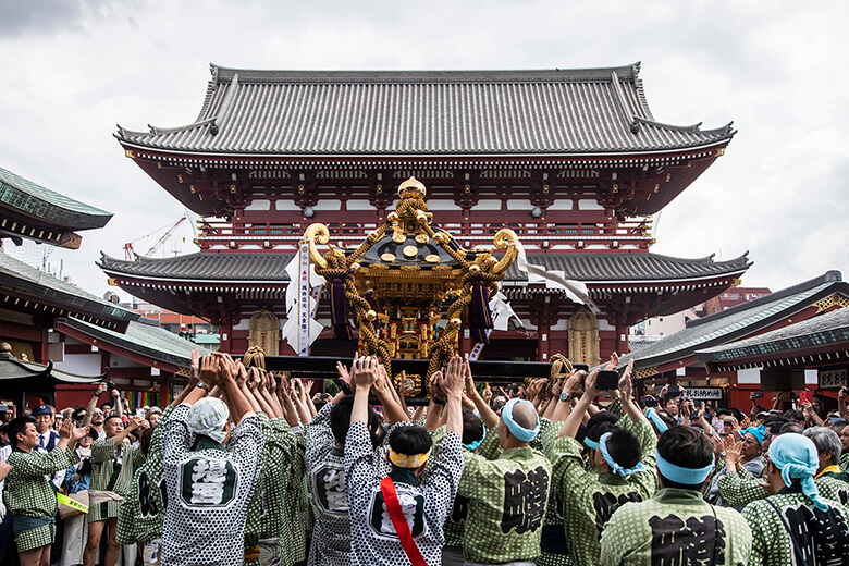 Matsuri often in involve carrying a mikoshi portable shrine through the streets