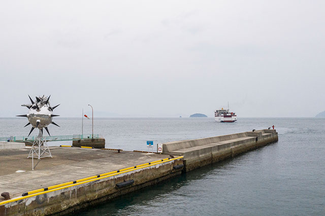 “Star Anger” – a creation of artist Kenji Yanobe depicts a dragon atop a spiked sphere at the port of Sakate