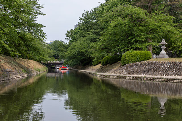 A canal runs past the grounds of Toyama Castle Park