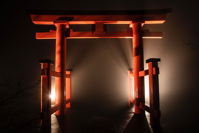 The red gate that marks the entrance to Hakone Shrine looks great at any time of the day