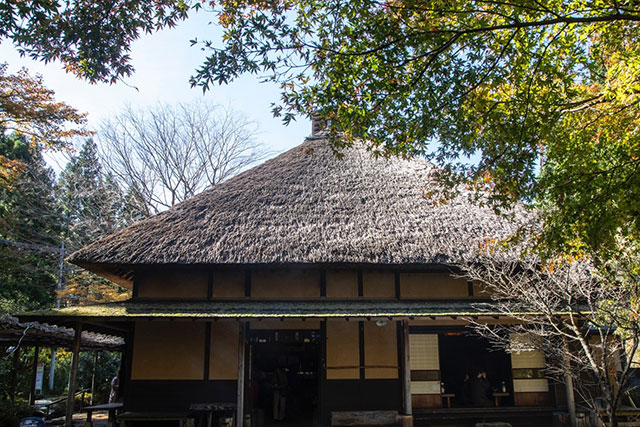 The Amazakechaya teahouse situated along the Tokkaido hiking path serves a variety of hot and cold drinks and snacks in an old Edo period building with a thatched roof