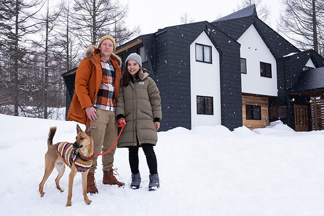 Justin, his wife Kaori and their dog Tito outside Onpoint Madarao